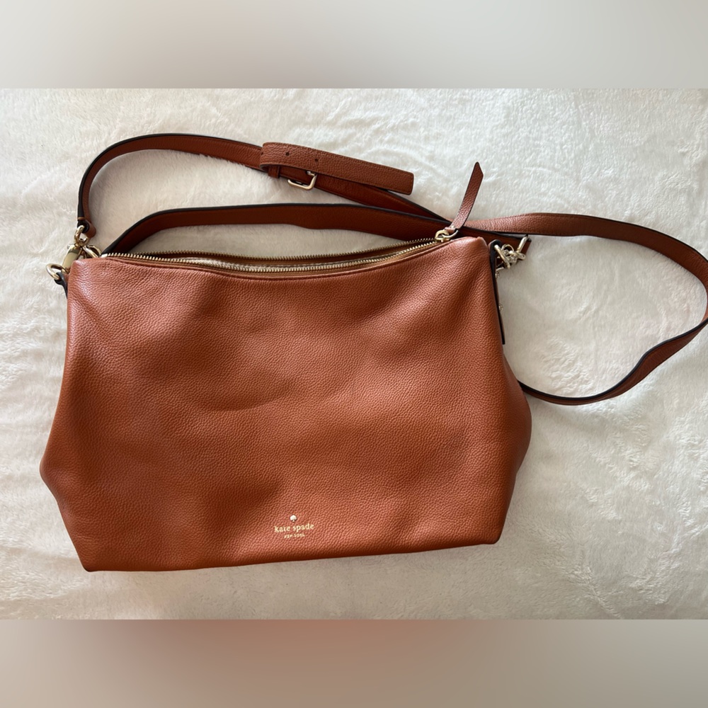 Slouchy brown Kate Spade handbag.